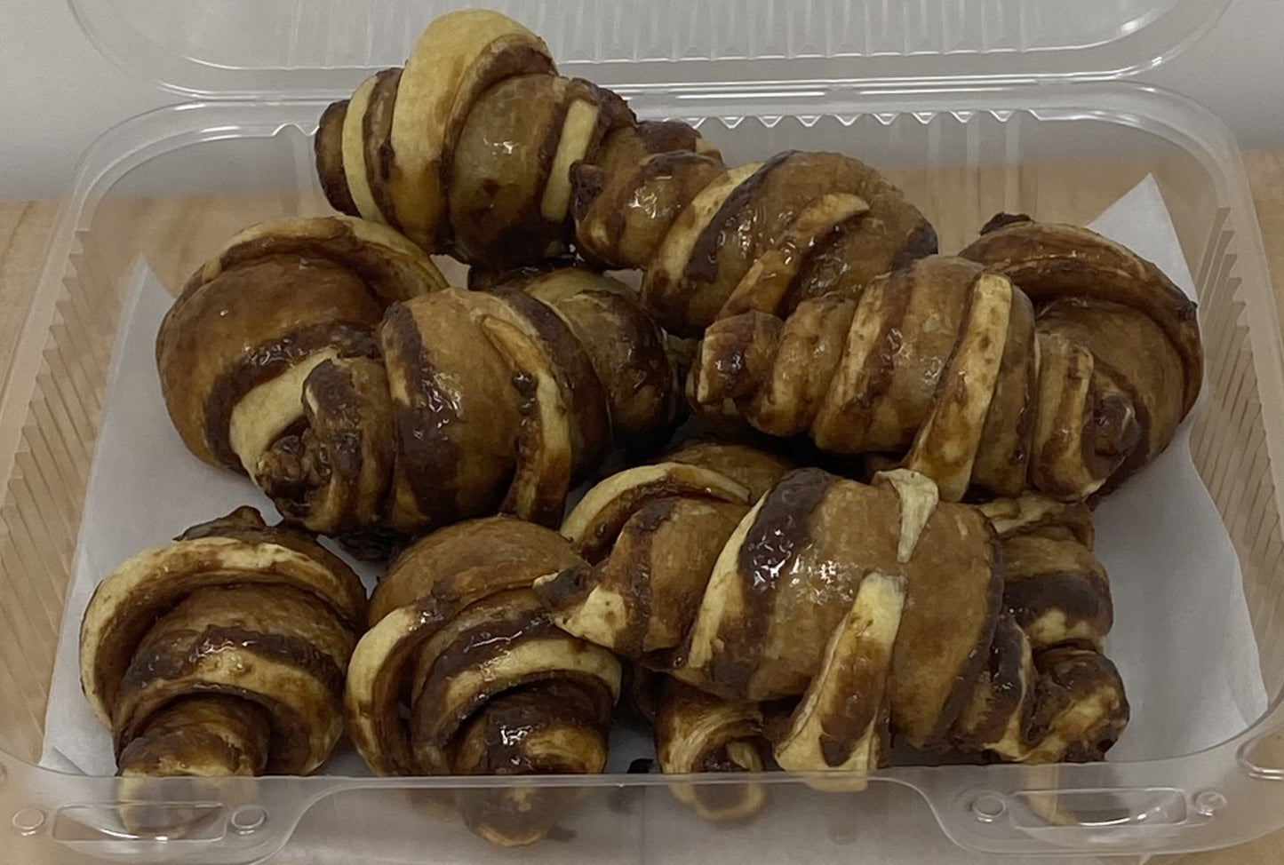 A tasty puff pastry rolled around a chocolate like filling.