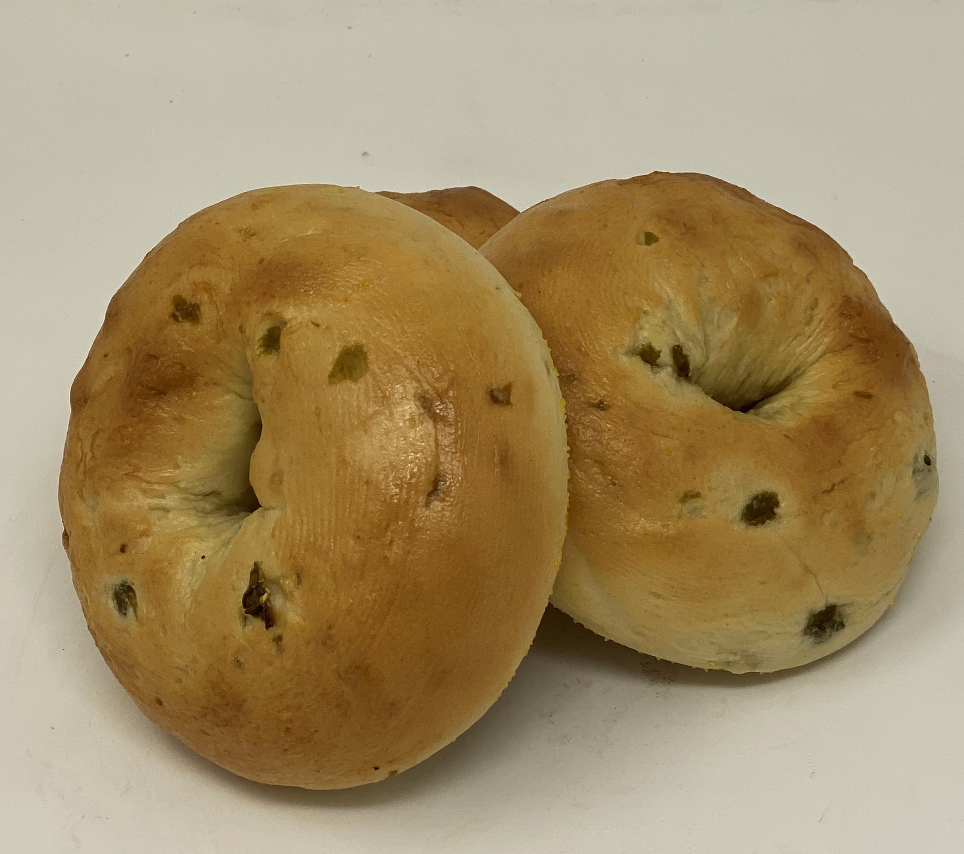 New York Style Jalapeño bagels. Our bagels are boiled and baked, not steamed. A little tough on the outside and soft on the inside.